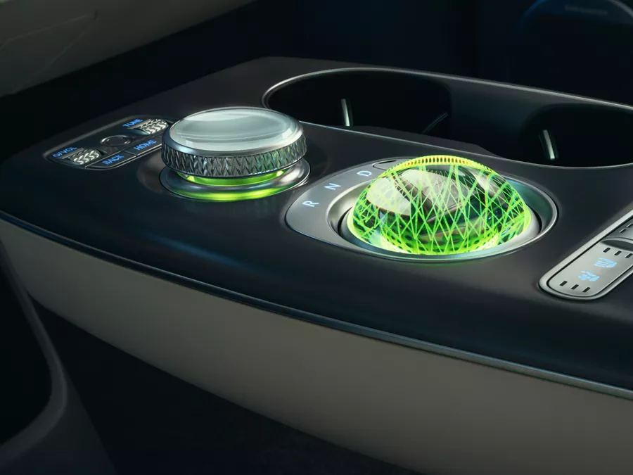 Interior close up of Crystal Sphere and Shift By Wire on center console, inside Genesis GV60