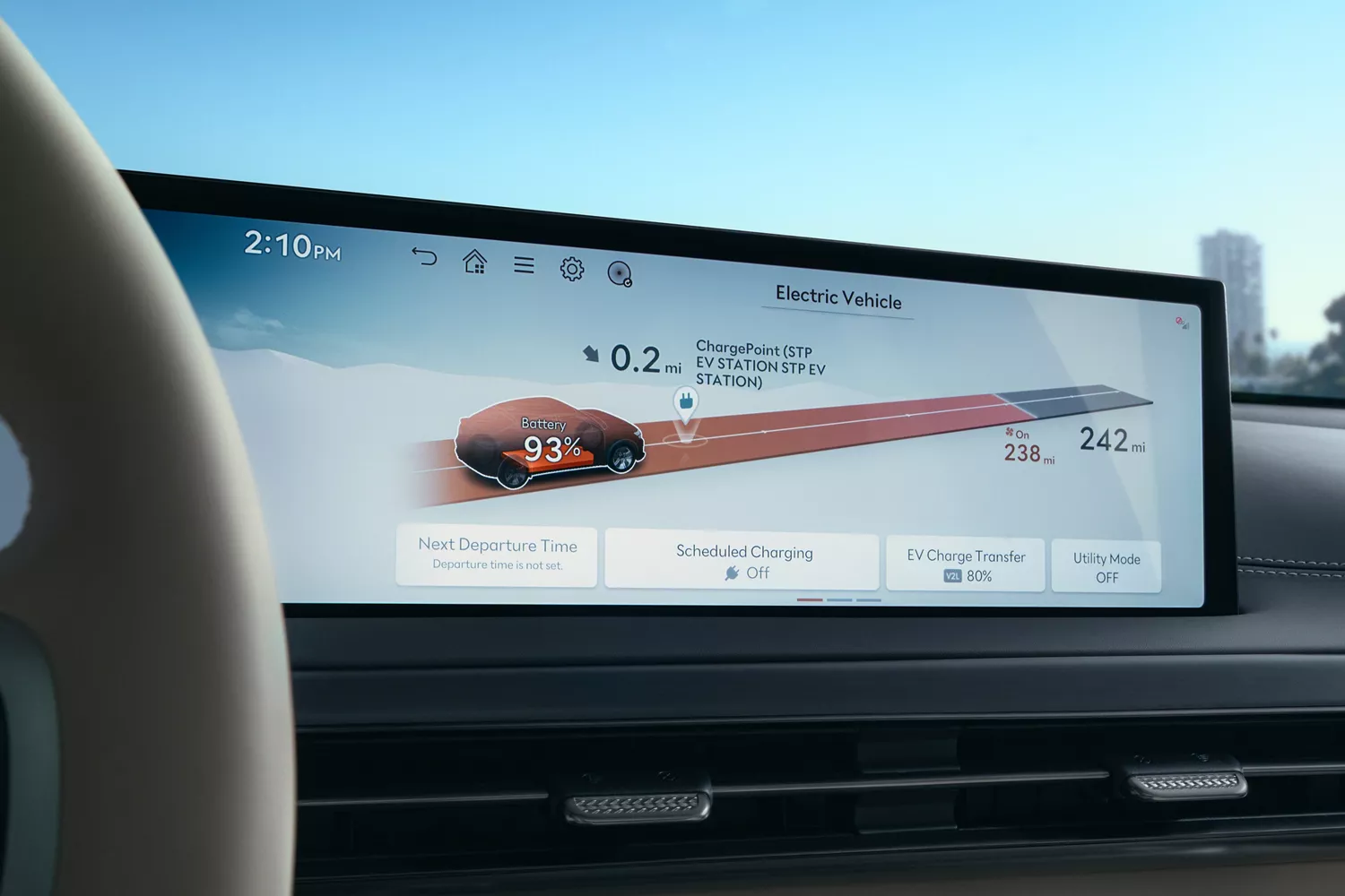 Interior close up of 27 inch OLED display showing battery percentage, inside Genesis GV60