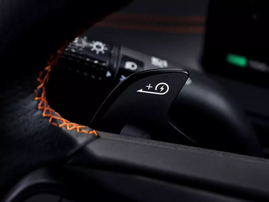 Interior close up of paddle shifter on steering wheel inside 2027 Genesis GV60 Magma