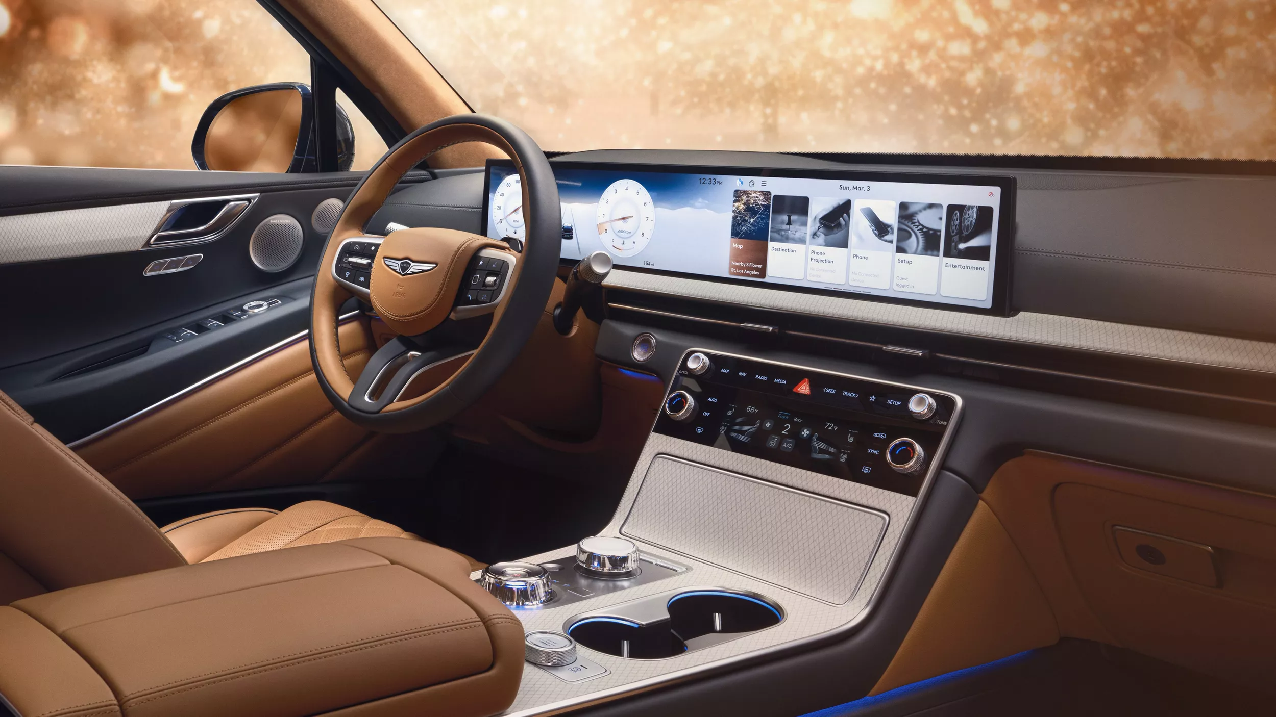 Front passenger pov of steering wheel & LED display in Genesis GV80 with tan leather interior