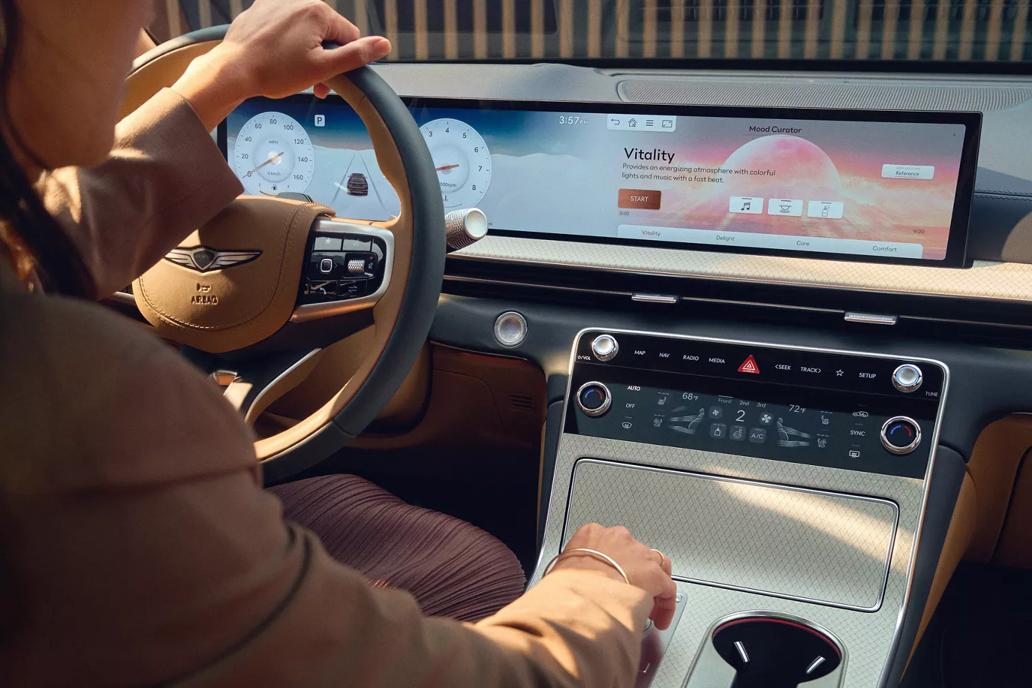 2026 Genesis GV80 interior pov from the backseat of a driver in the front and 27 inch OLED display