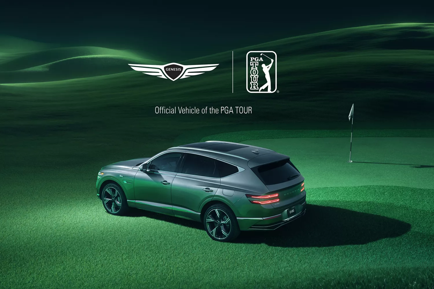 Rear drivers pov of 2026 Genesis GV80 on green rolling hills golf course, Genesis & PGA logos above