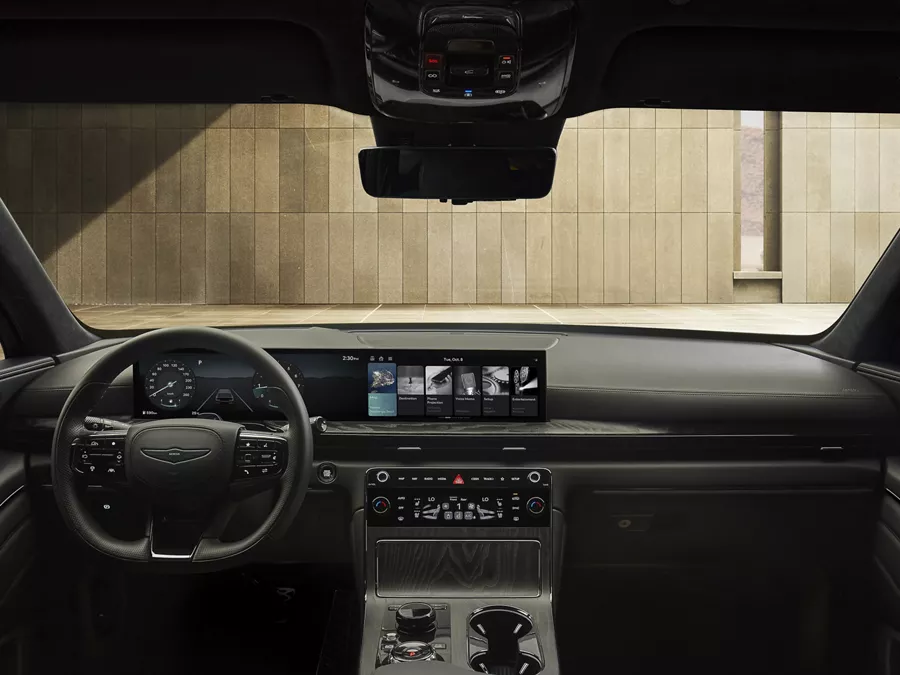 Interior view of steering wheel and dashboard inside 2026 Genesis GV80 Coupe Prestige Black
