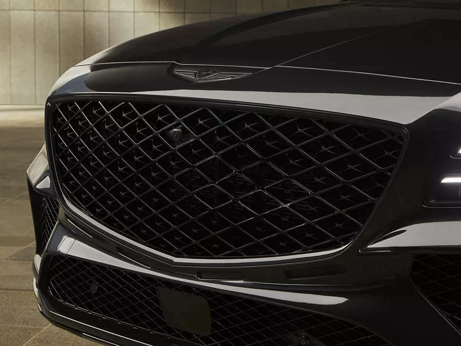 Close up of grille and headlight details on 2026 Genesis GV80 Coupe Prestige Black