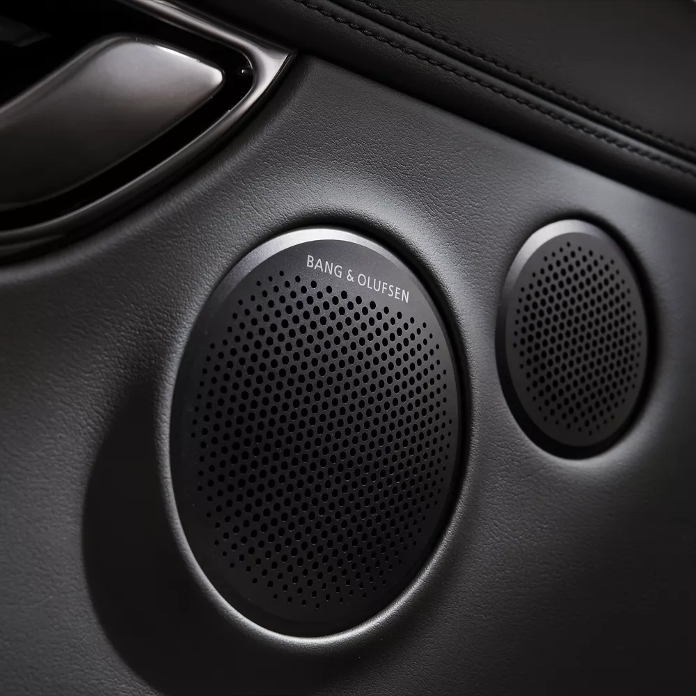 Interior closeup of Bang & Olufsen speaker inside Genesis GV80 Coupe Prestige Black