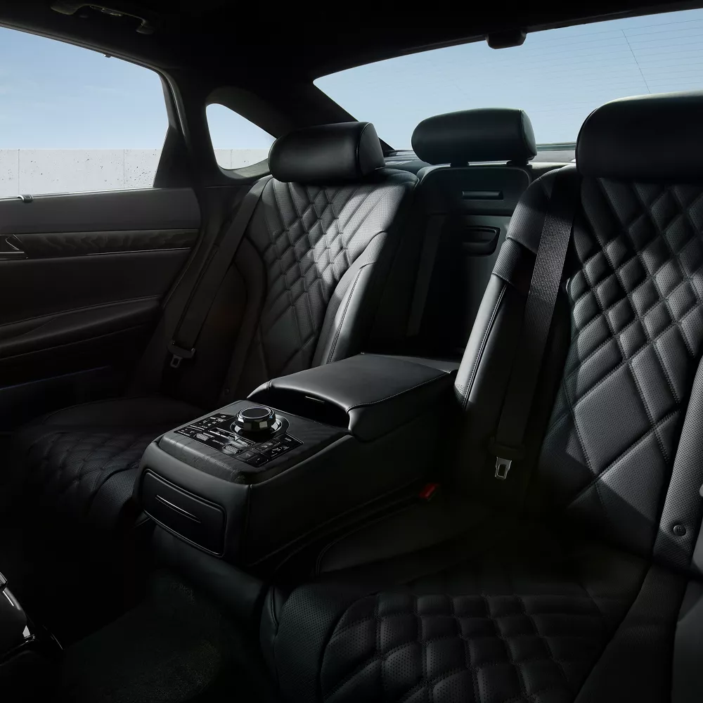 Interior pov of black nappa leather rear seating inside Genesis G80 Prestige Black