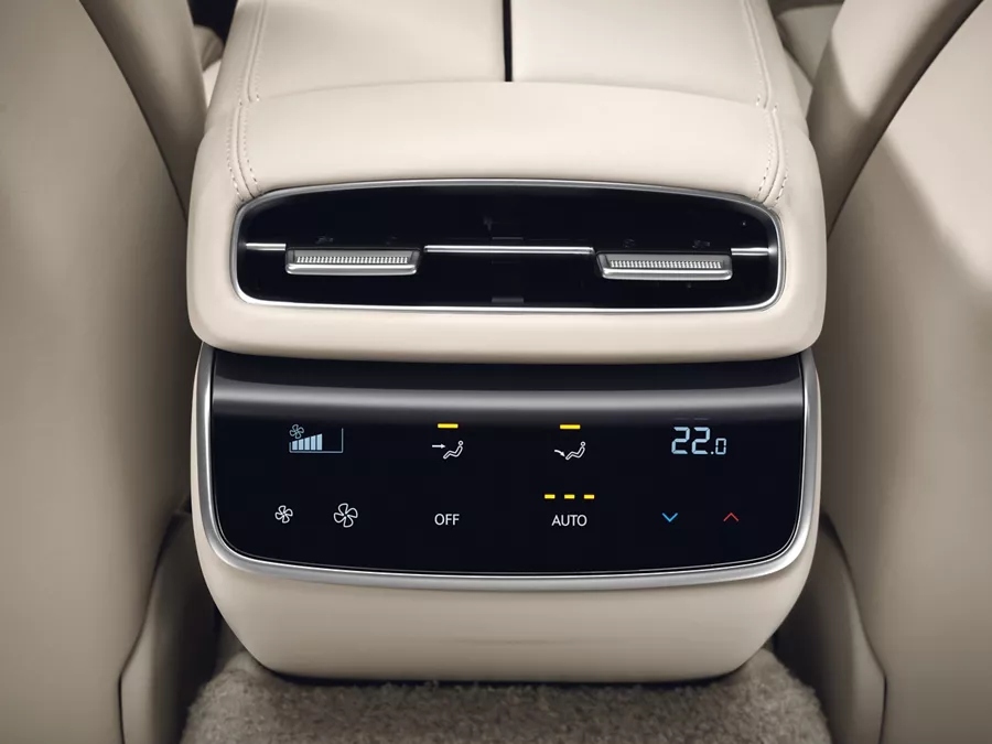 Rear passenger seat close-up of Genesis G80 climate control panel with digital display and air vents