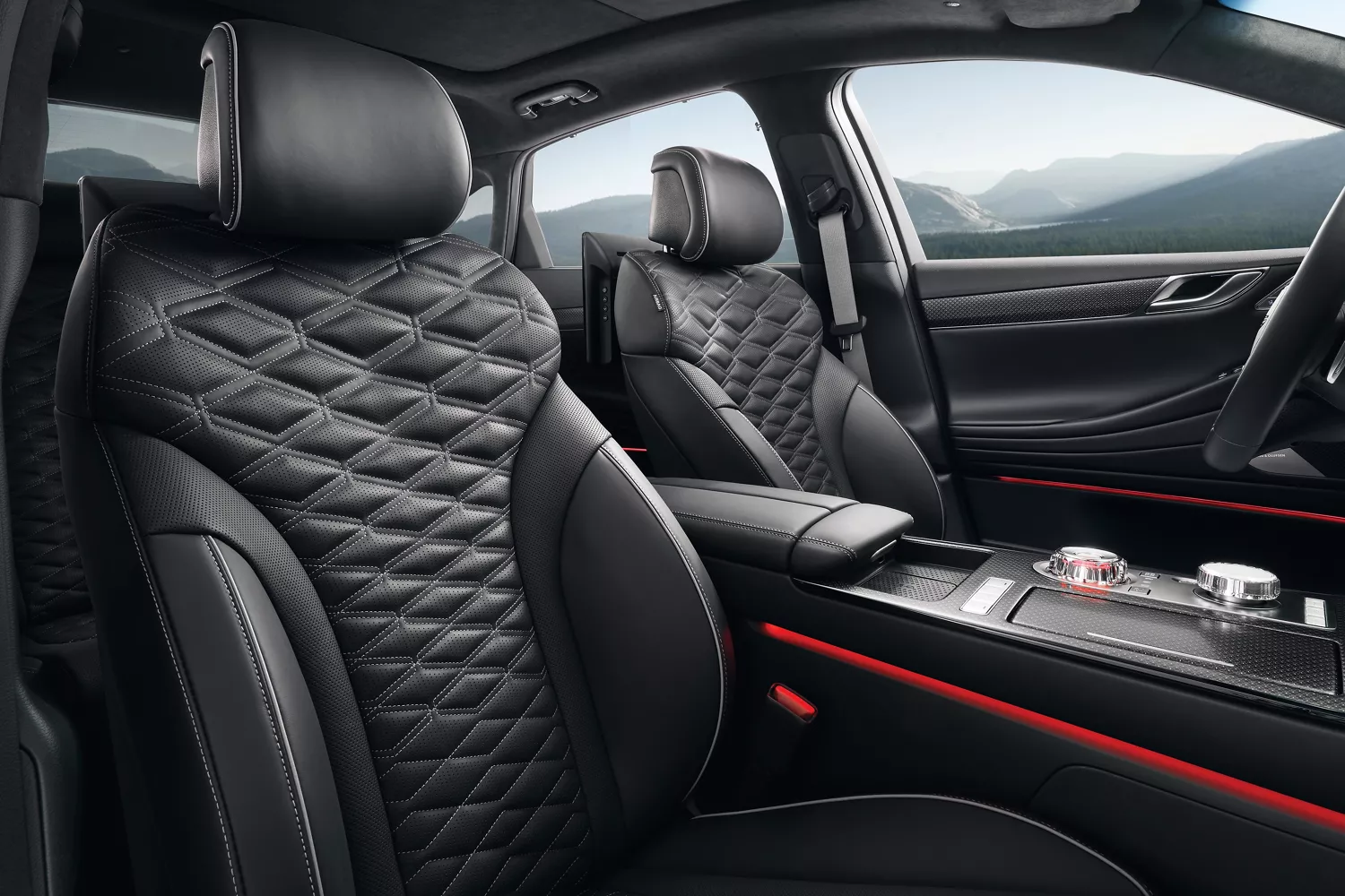 Interior passenger view of front seats in 2026 Genesis G80 with black Nappa leather seats