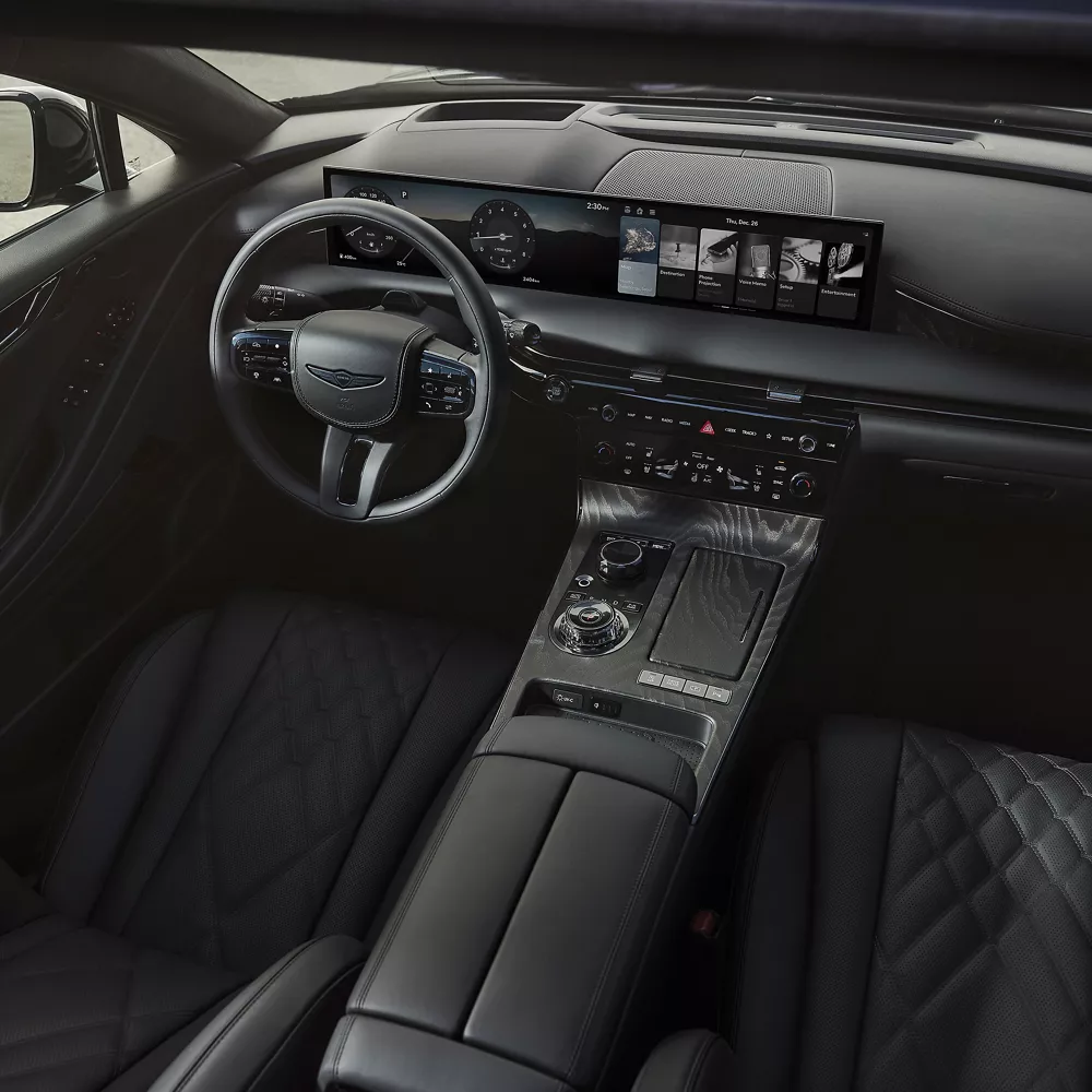 High angle interior view of blacked-out cockpit inside Genesis G80 Prestige Black