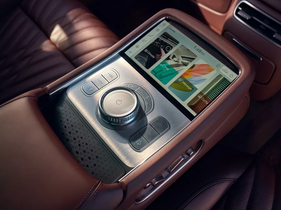 Interior close up of center console in Bordeaux brown inside the 2026 Genesis G90