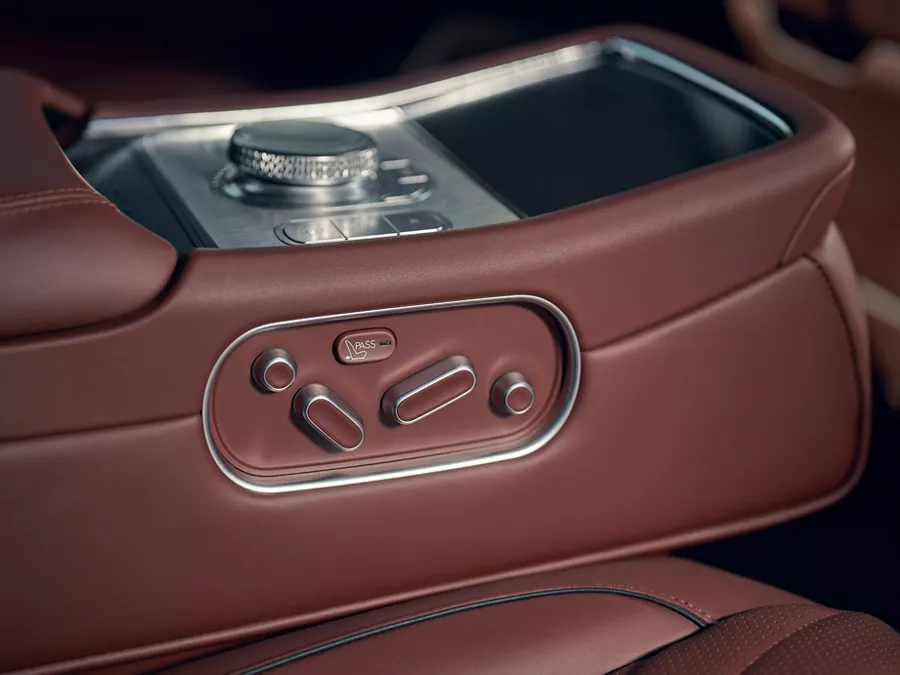 Close up of interior seating control panel in Bordeaux brown inside 2026 Genesis G90