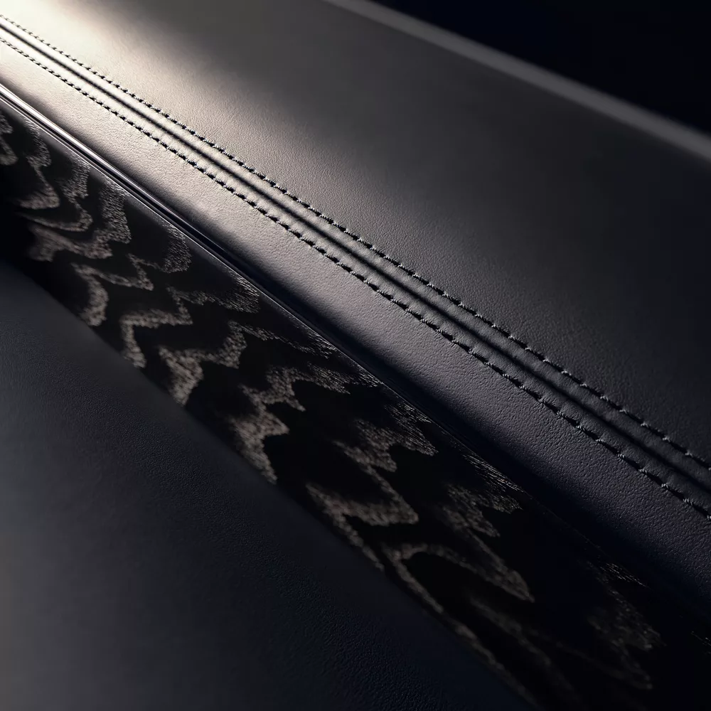 Close up of side door wood paneling inside 2026 Genesis G90 in Prestige Black