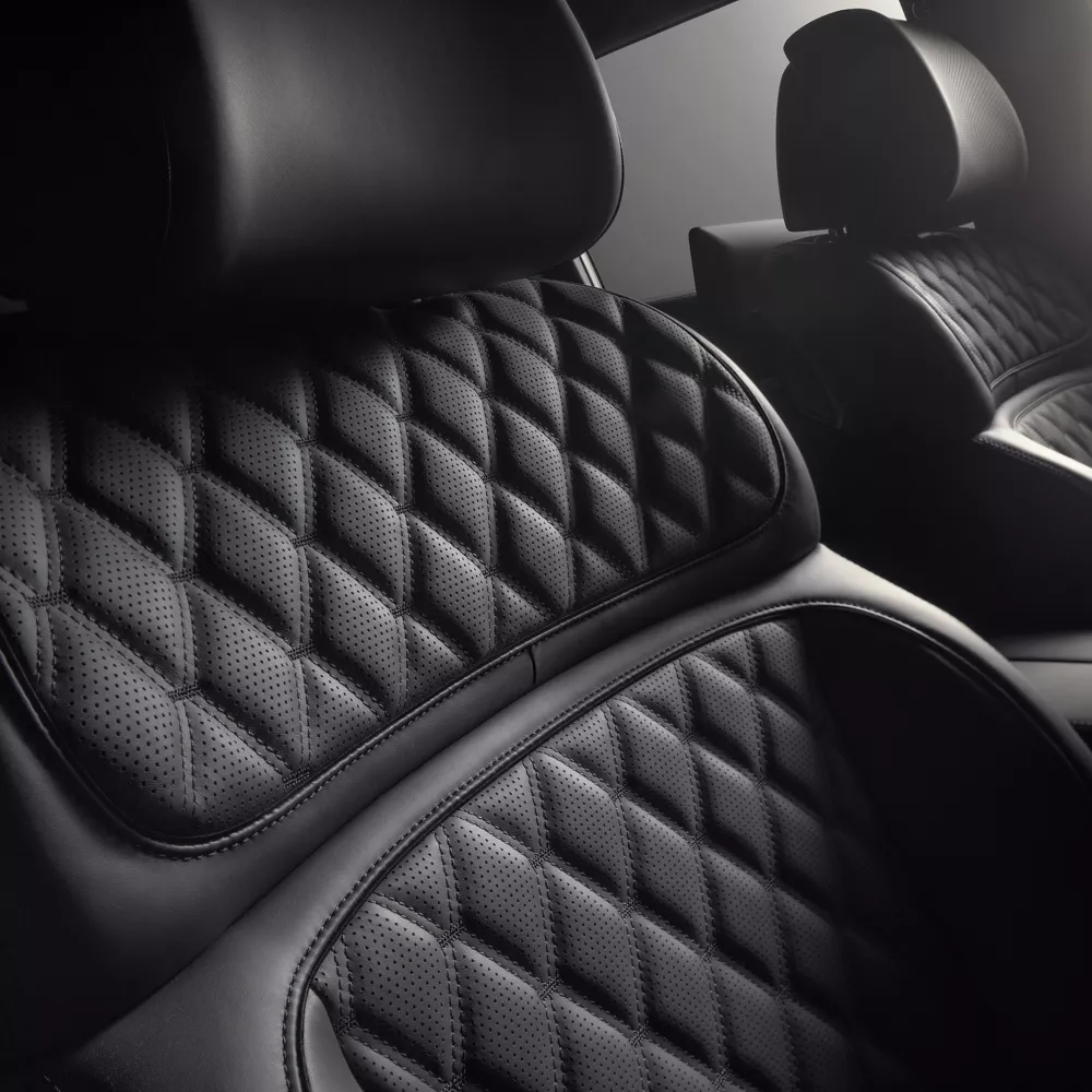 Close up of quilted Nappa leather seats inside 2026 Genesis G90 in Prestige Black