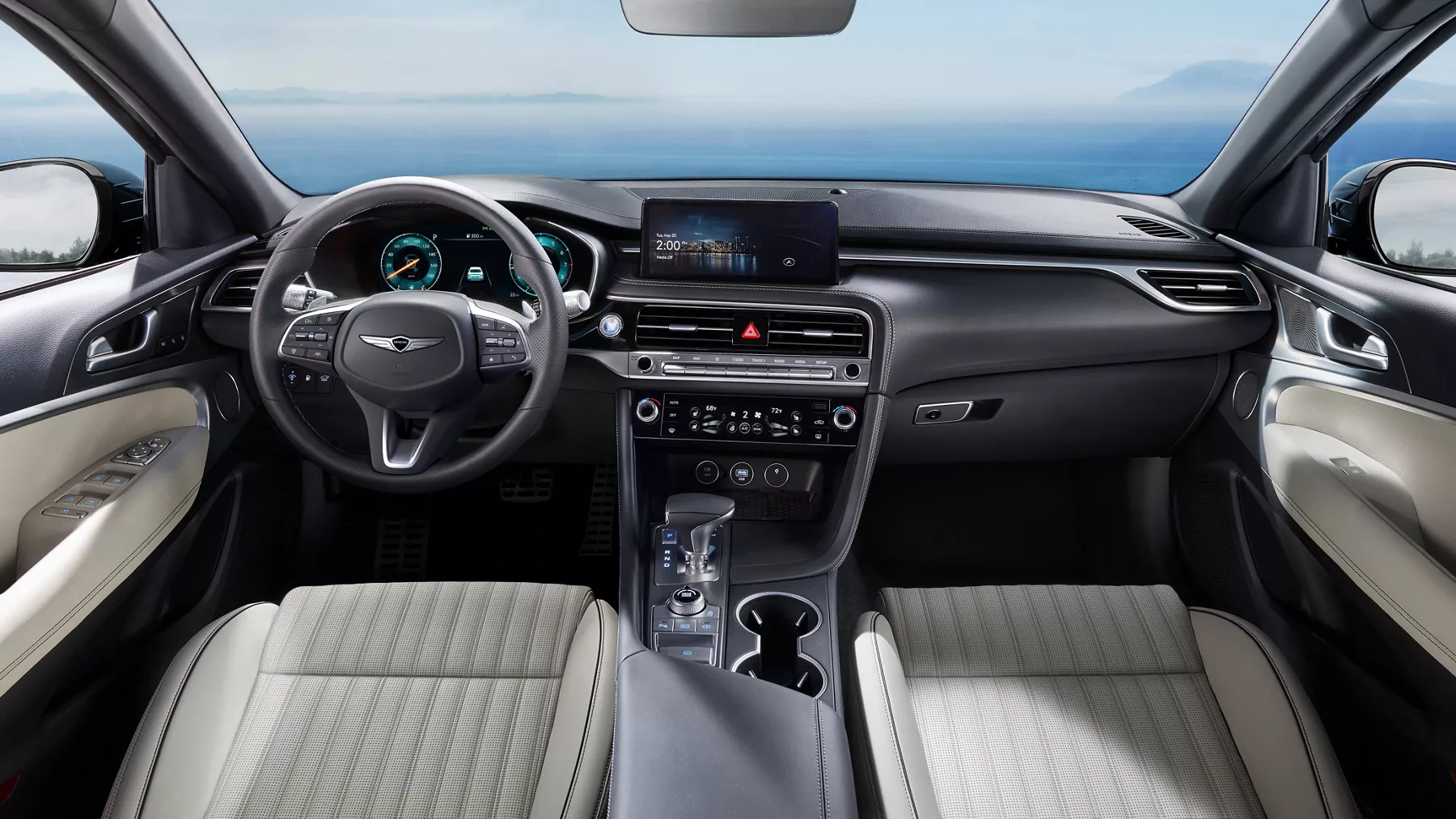Interior view of quilted Nappa leather front seats and cockpit inside the Genesis G70