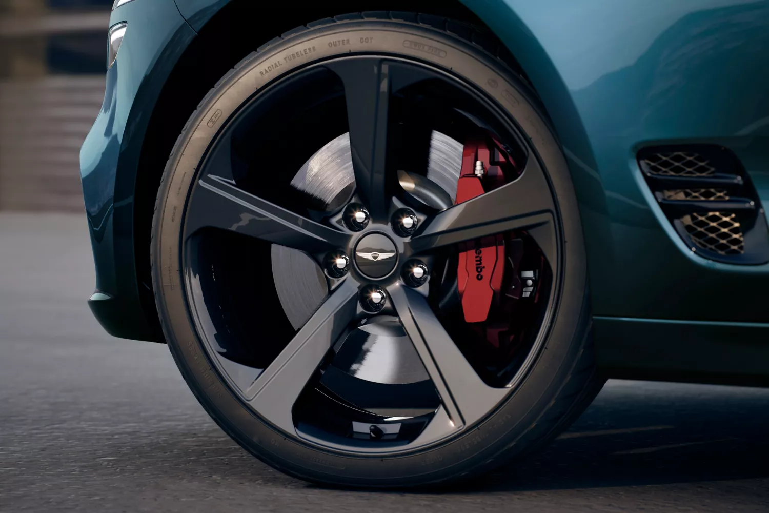 Close up of wheel and brake caliper details on 2027 Genesis G70