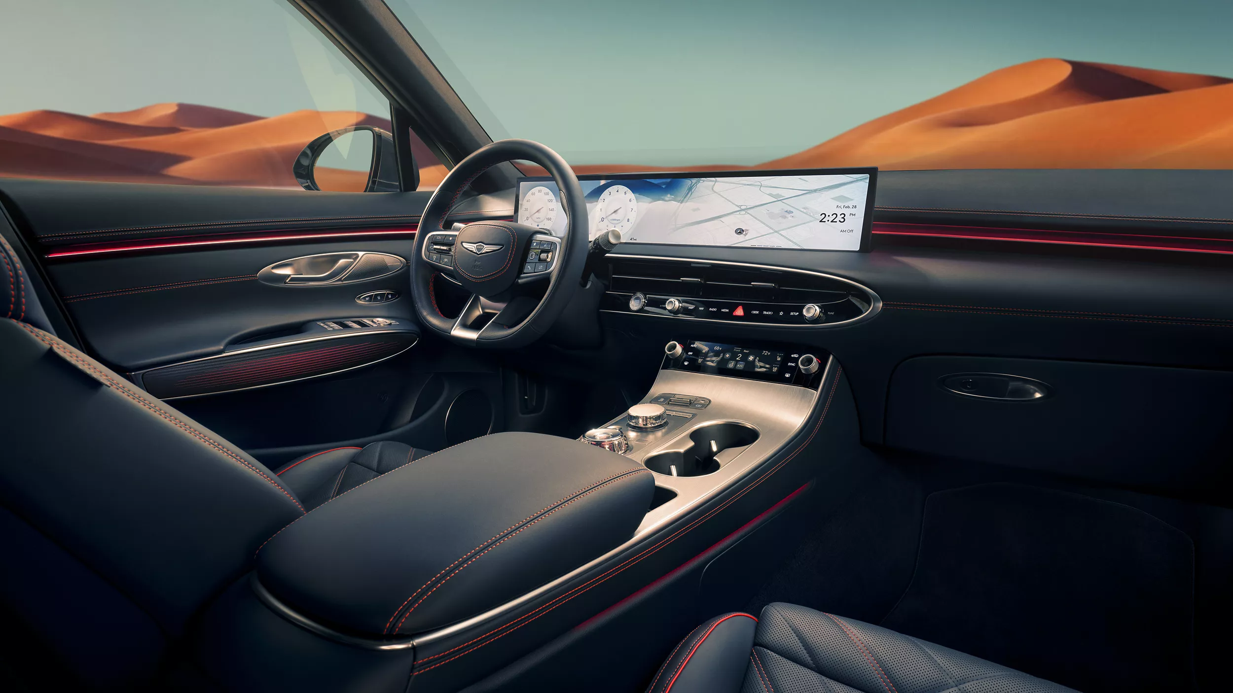 Interior view of blue front seating inside Genesis GV70 with blue sky and mountains in background