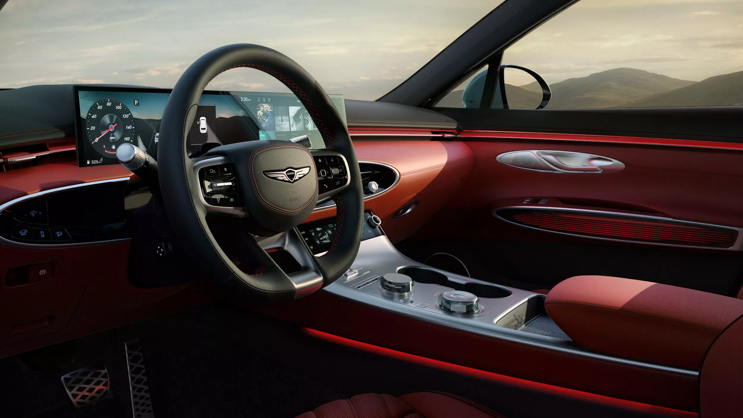 Driver seat pov inside Genesis GV70 with Sevilla Red interior and Obsidian Black accents