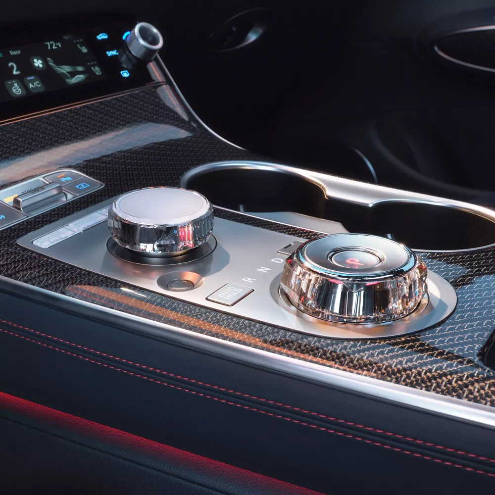 Interior close-up from driver seat pov center console inside Genesis GV70