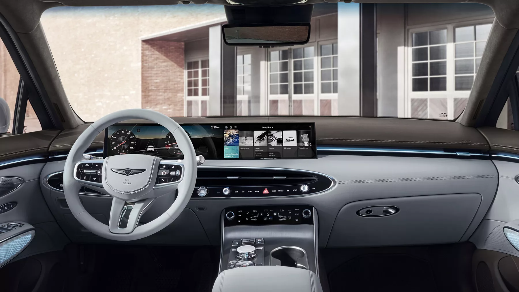 Interior shot of full interior dash from the pov of backseat inside Genesis GV70