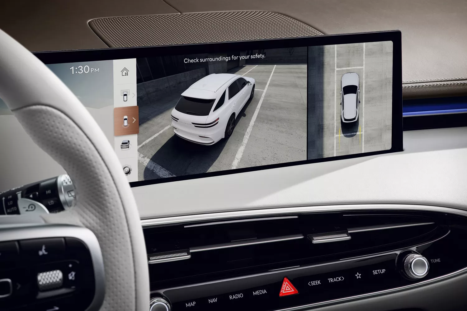Interior driver POV of surround view monitor with parking assist in Genesis Electrified GV70