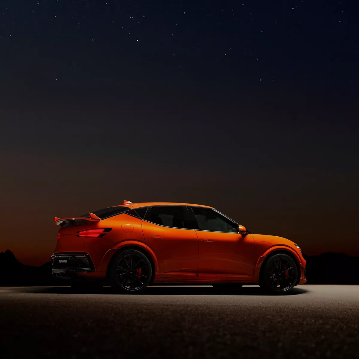 2027 Genesis GV60 Magma in orange under night sky, highlighting award-winning innovative design