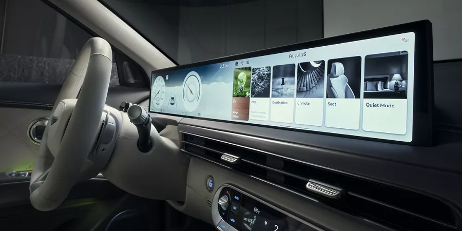 Interior passenger side pov of 27 inch OLED display, inside Genesis GV60