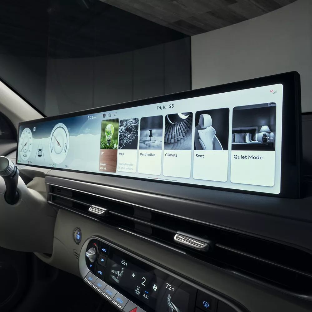 Interior view of 27 inch OLED infotainment screen inside Genesis GV60