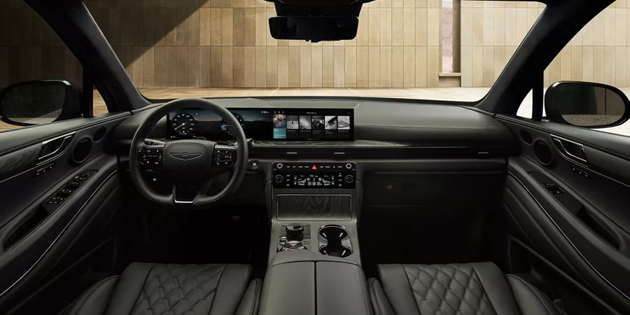 Interior view of black Nappa leather front seats & cockpit inside Genesis GV80 Coupe Prestige Black
