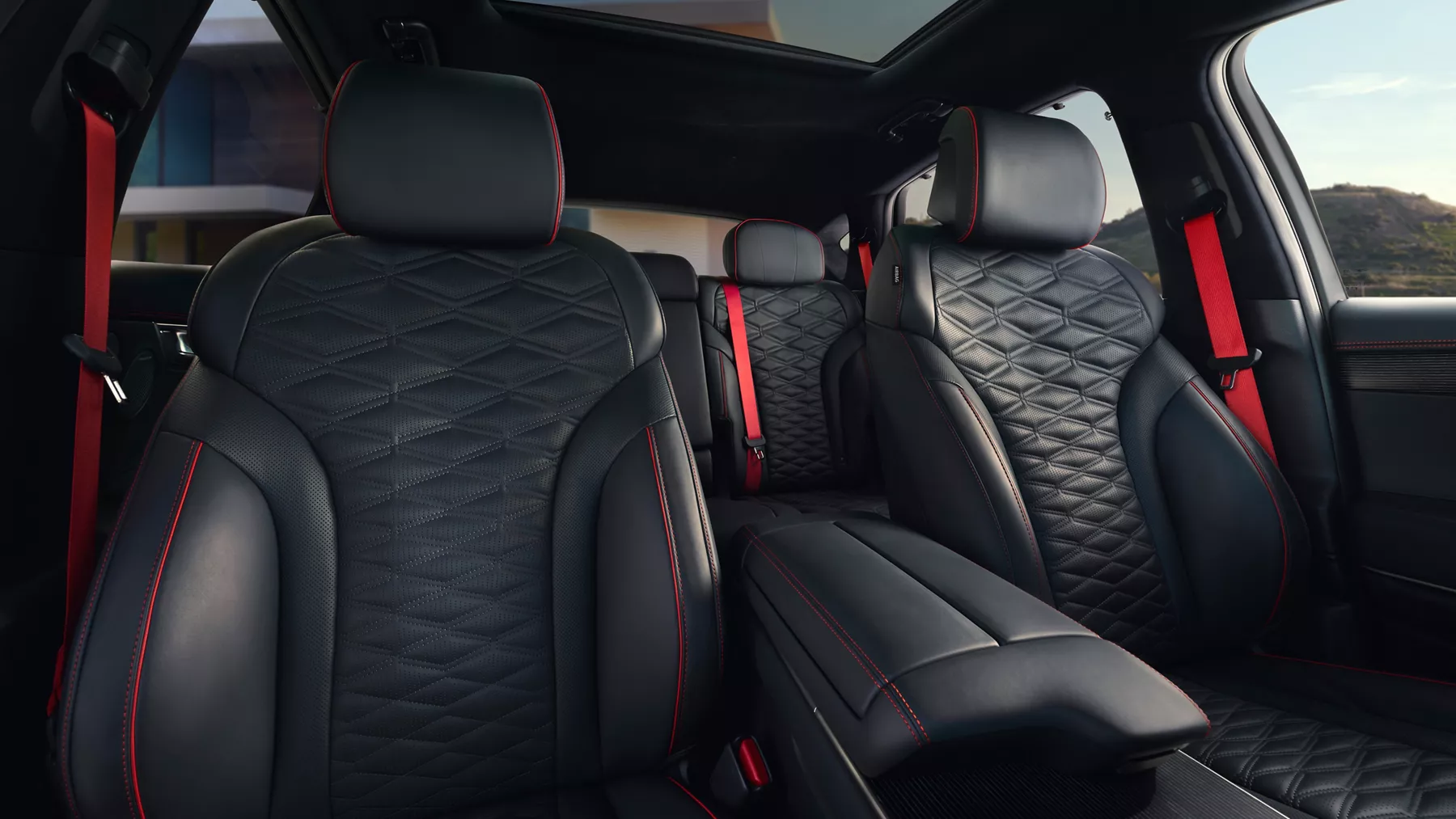 Interior view of front and rear Nappa leather seating inside Genesis GV80 Coupe
