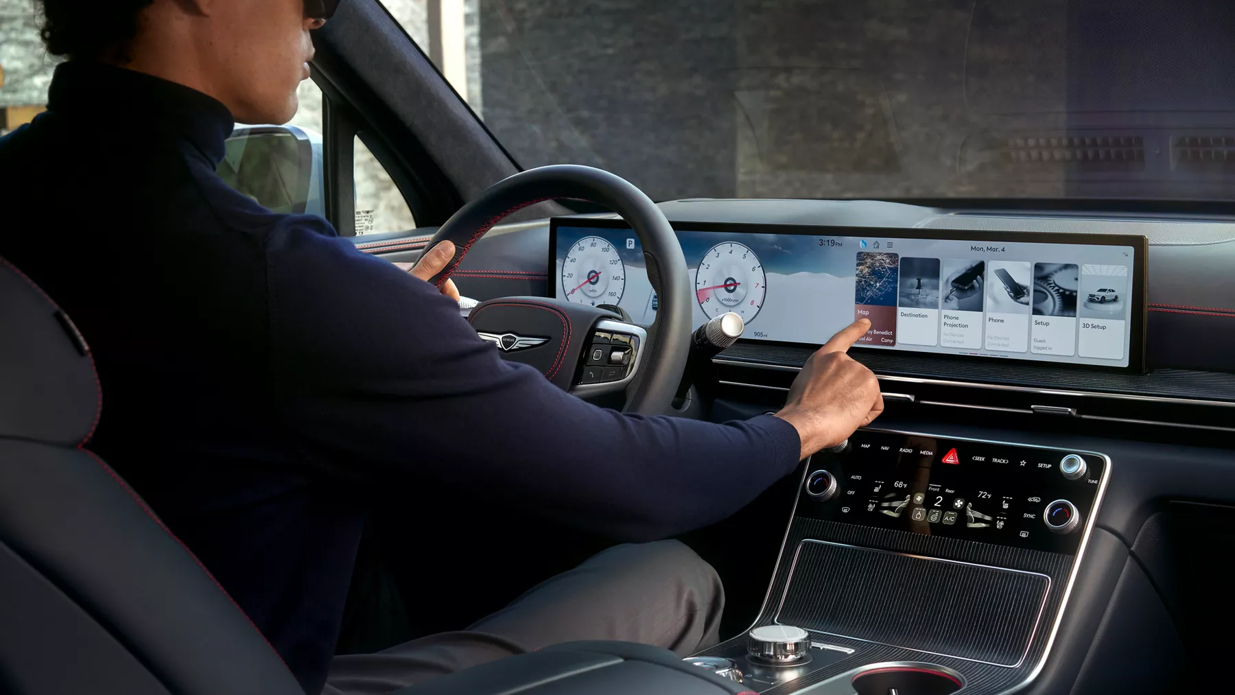Interior image of driver touching the Navigation Integrated display inside Genesis GV80 Coupe