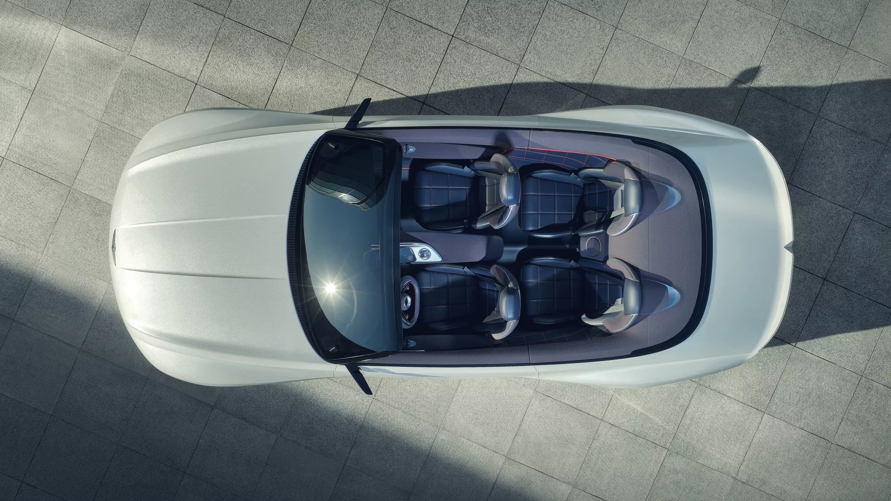 View of X Convertible Concept from above, with the convertible top down and displaying the four seats inside.
