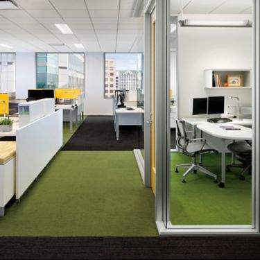 Interface Monochrome and Striation carpet tile in walkway of office with multiple open offices and a private office image number 1