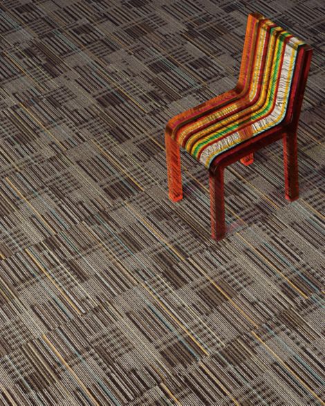 Detail of Interface Cordoba Colores carpet tile with chair