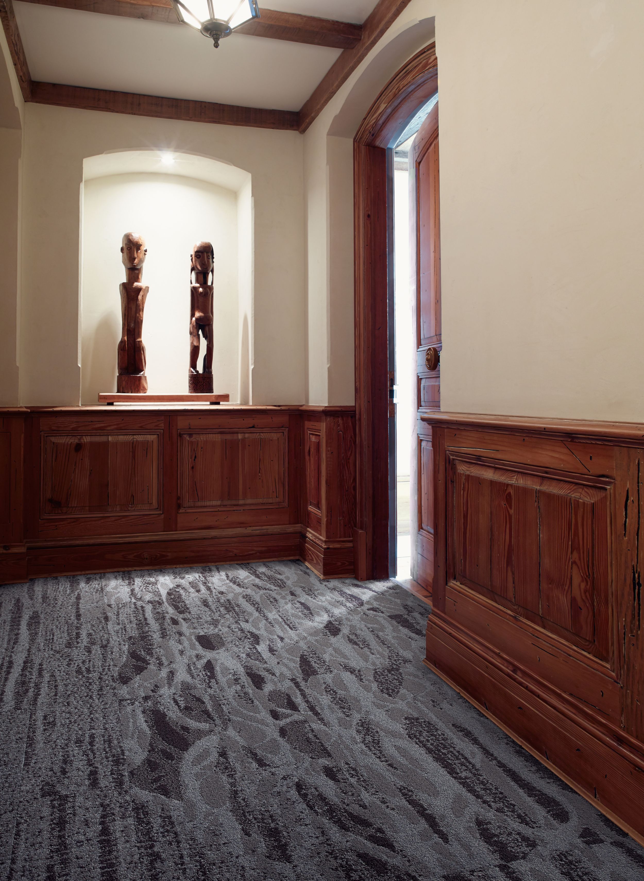 Interface PM67 plank carpet tile and PM68 carpet tile in hallway with wooden and white walls image number 1