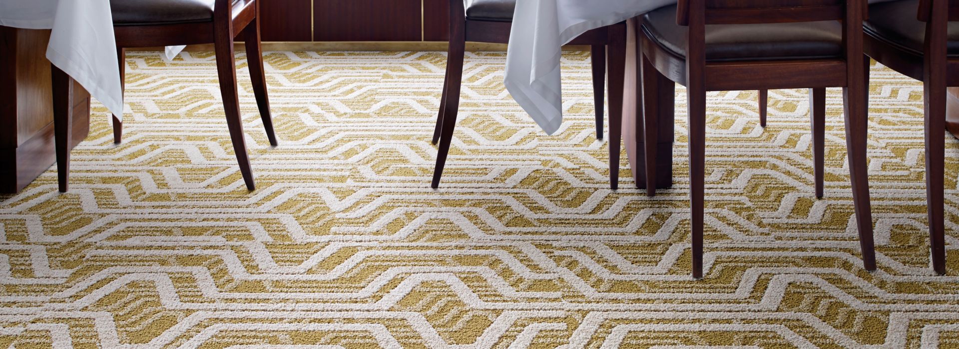 Interface PM01 and PM19 plank carpet tile in upscale dining area