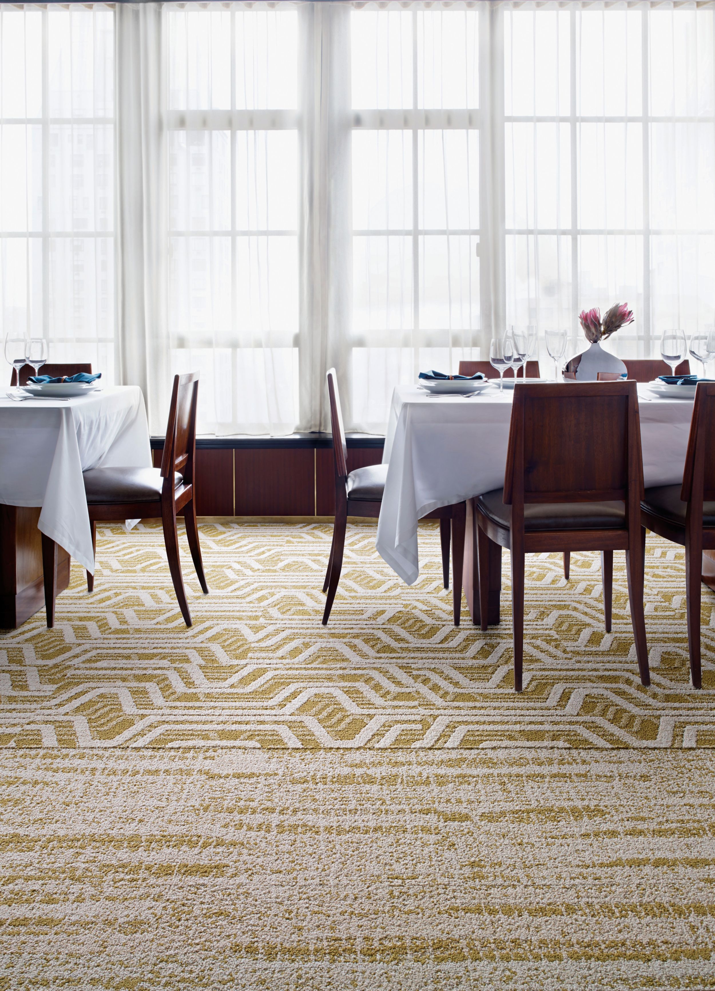 Interface PM01 and PM19 plank carpet tile in upscale dining area image number 1