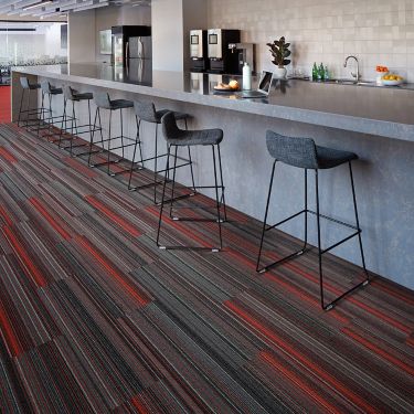 Interface Aglow plank carpet tile and Studio Set LVT in cafe