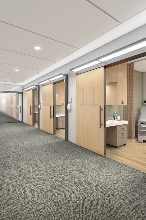 Interface Diamond Dream carpet tile and Textured Woodgrains LVT in corridor and exam rooms