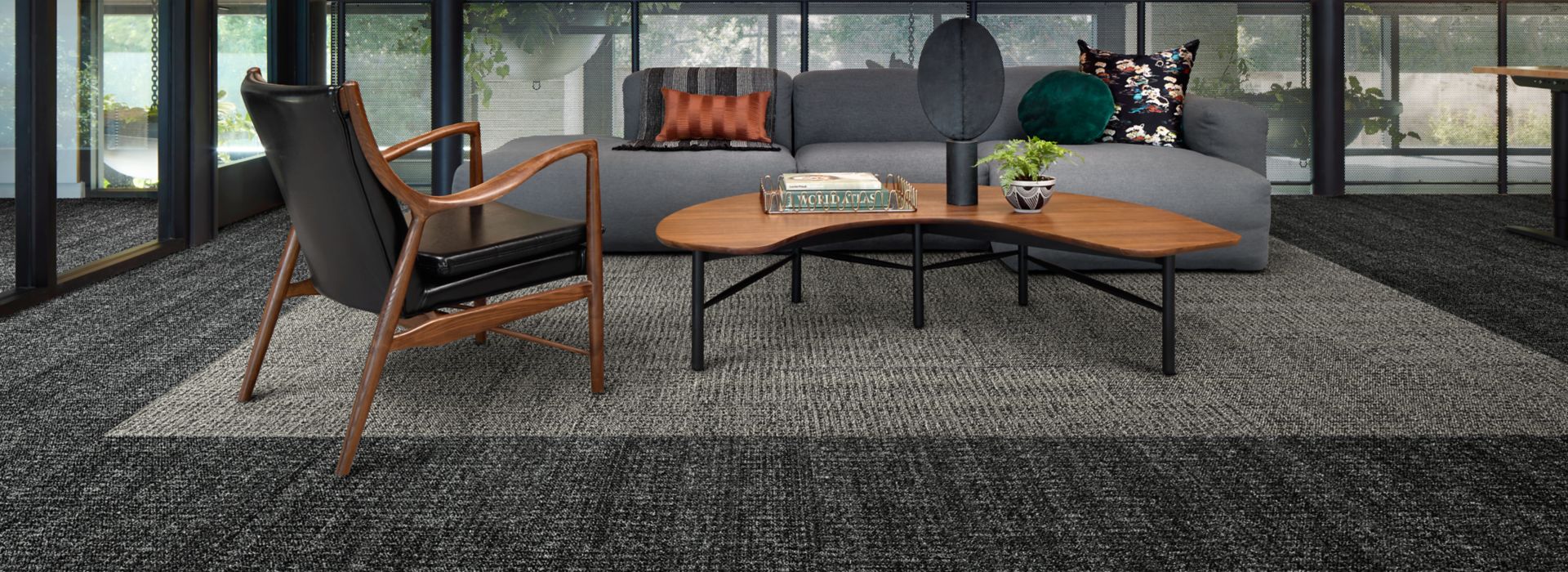Interface Diddley Dot plank carpet tile in lobby