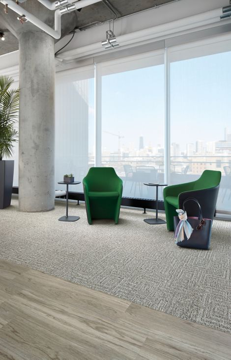 Interface Open Air 413 carpet tile with Natural Woodgrains LVT in lobby with green chairs