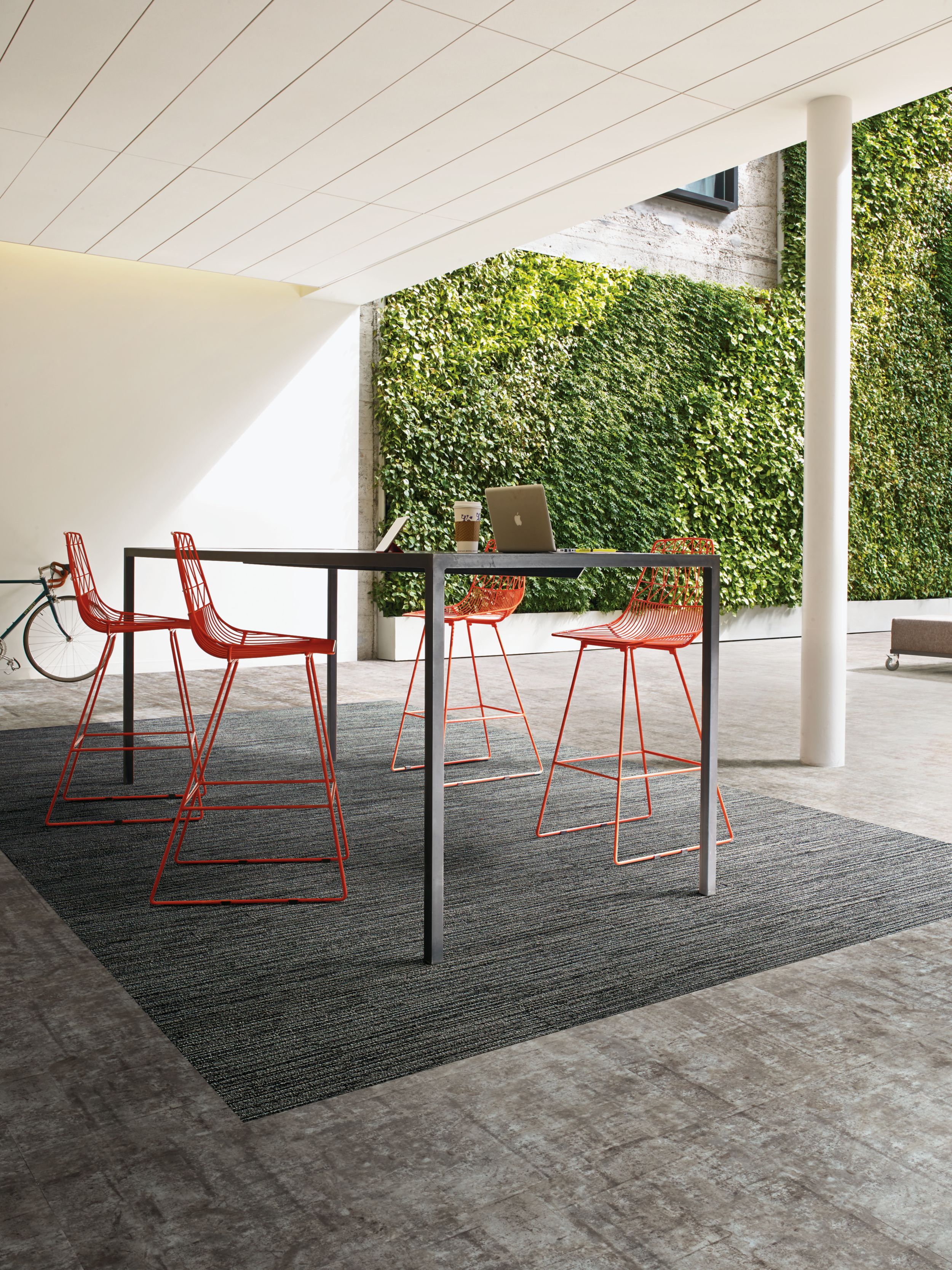 Interface Winter Sun and Evening Sun plank carpet tile with Textured Stones LVT in outdoor area with table and chairs image number 2