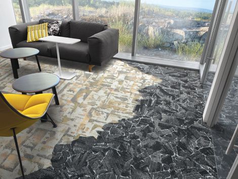 Interface Panola Mountain and Mile Rock carpet tile in small room with black couch and yellow chair imagen número 3