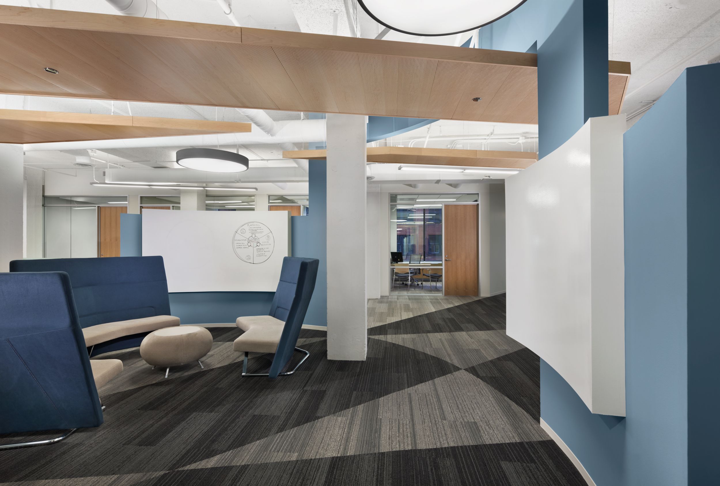 Interface Walk the Plank plank carpet tile in seating area of modern office with suspended wood ceiling imagen número 12