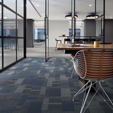 Interface Geisha Gather plank carpet tile and Brushed Lines LVT in meeting room