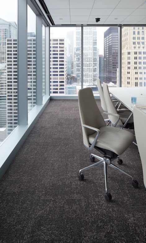 Interface Cloud Cover carpet tile in meeting room with glass walls
