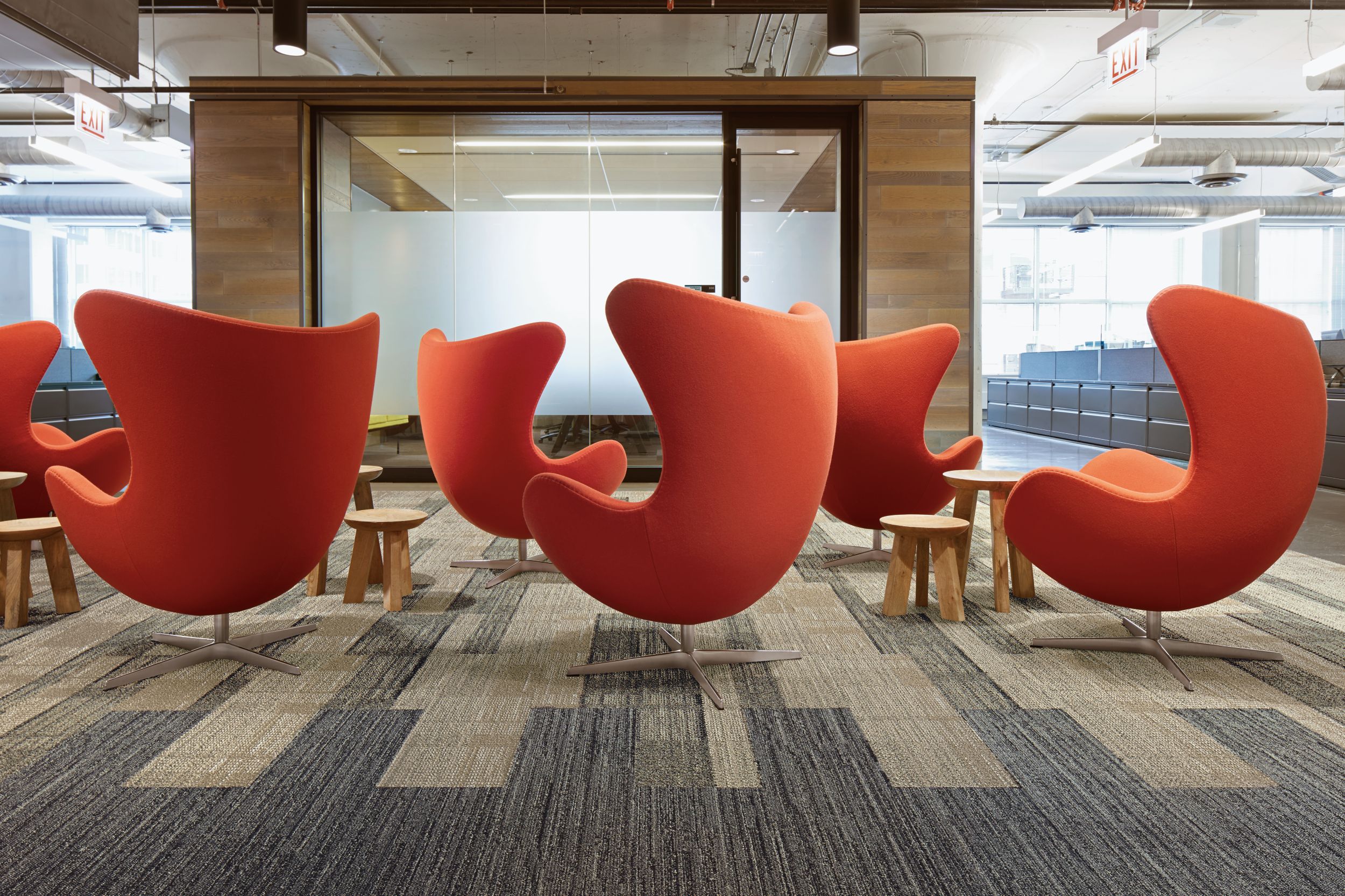 Interface Summerhouse Shades and WW880 carpet tile in seating area with large red chairs image number 3