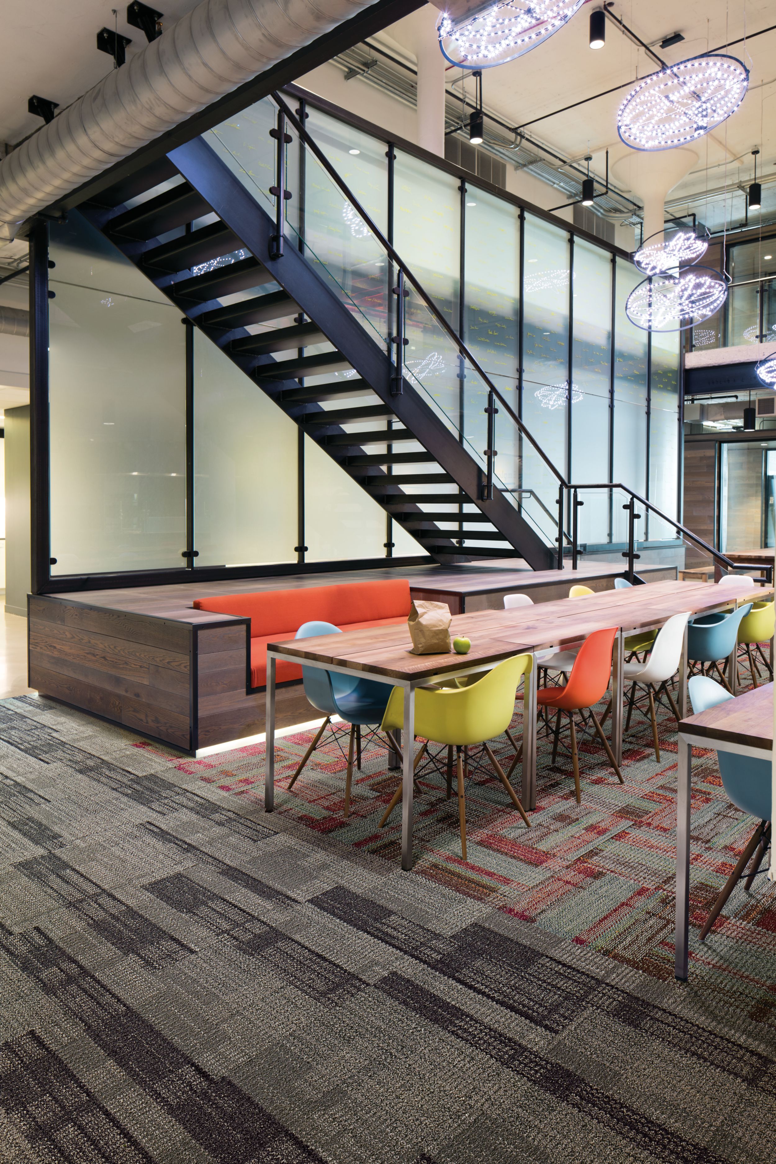 Interface SummerHouse Brights and SummerHouse Shades  carpet tile with long table and chairs under stairwell imagen número 2