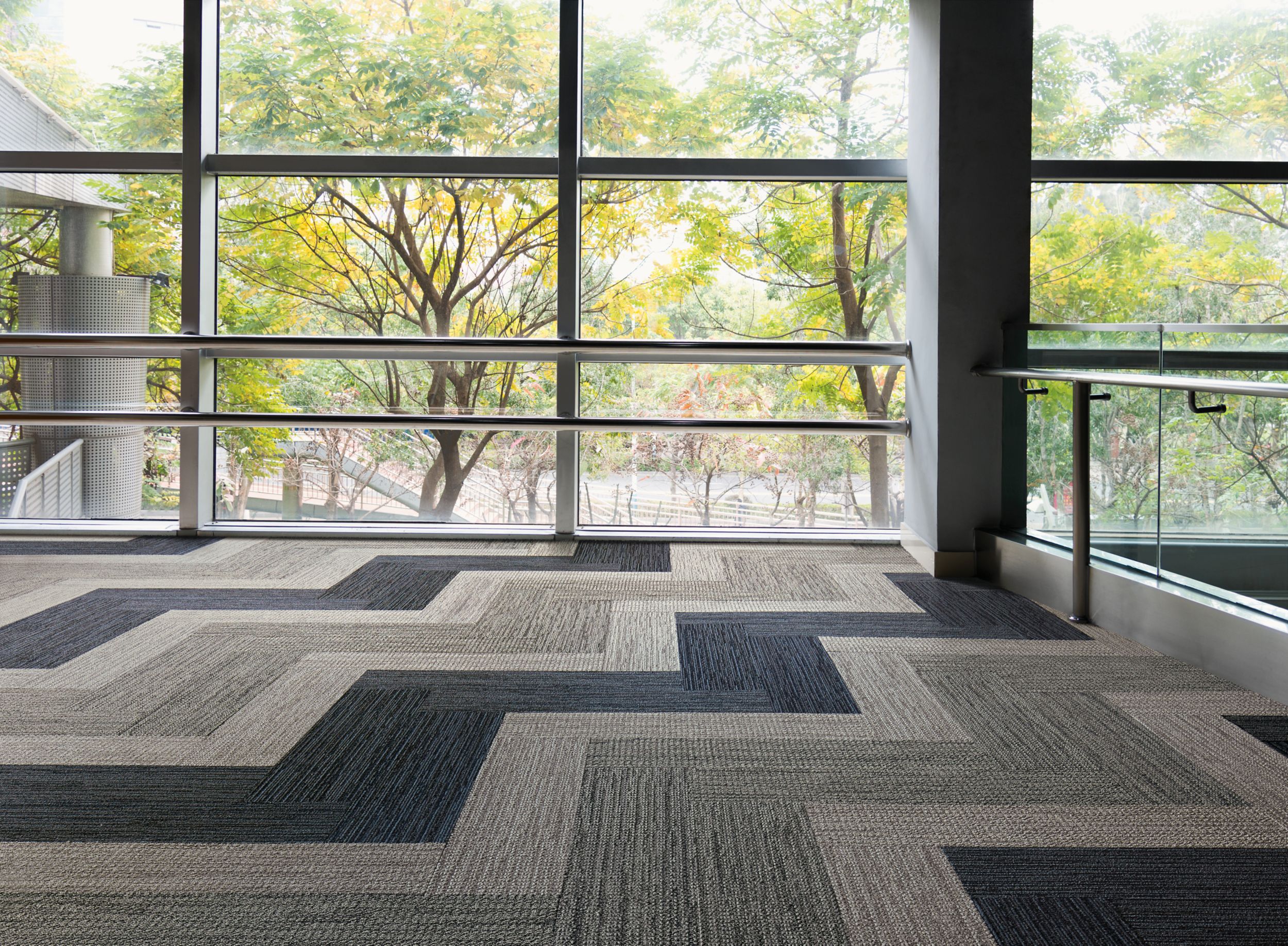 Interface Afternoon Light and Winter Sun carpet tile in open area with glass walls image number 2