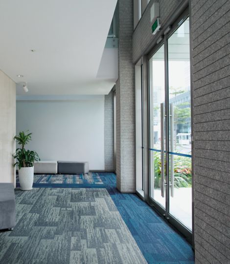 Interface AE311, AE315 and AE317 plank carpet tile in multifamily corridor image number 7