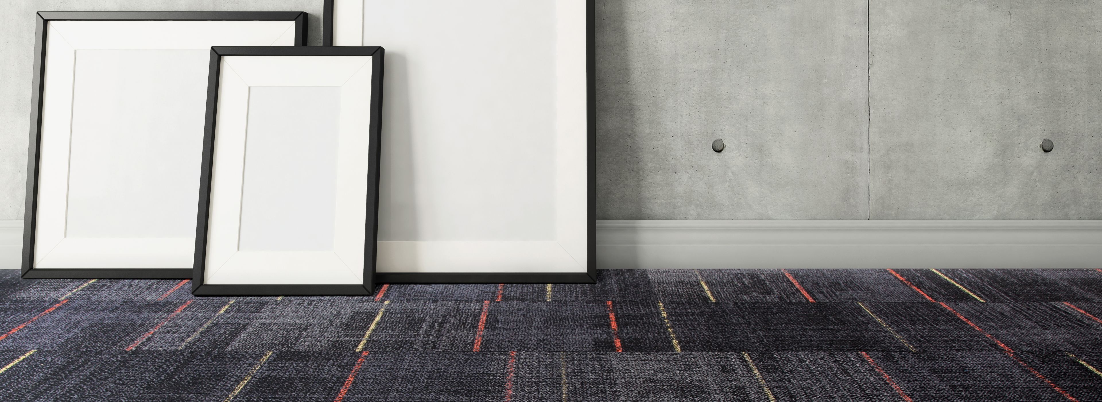 Interface AE312 carpet tile in open room with blank canvases against wall imagen número 1